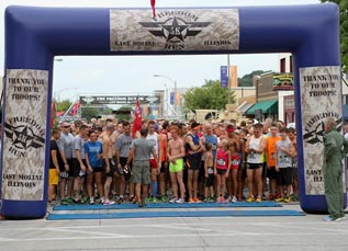 photo of a runner crossing the finish line